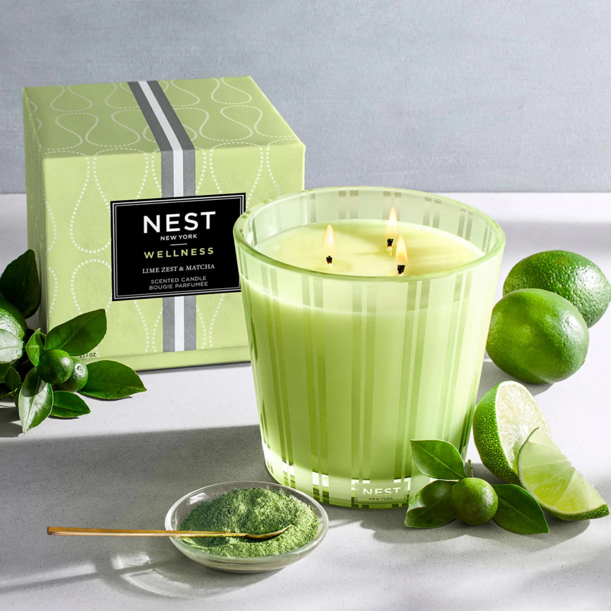 Topview Lifestyle Photo of Nest New York’s Lime Zest & Matcha 3-Wick Candle with Box